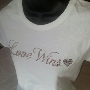 Love Wins red ruby graphic on white